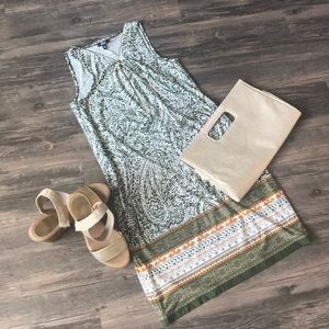 A sleeveless multi-colored dress